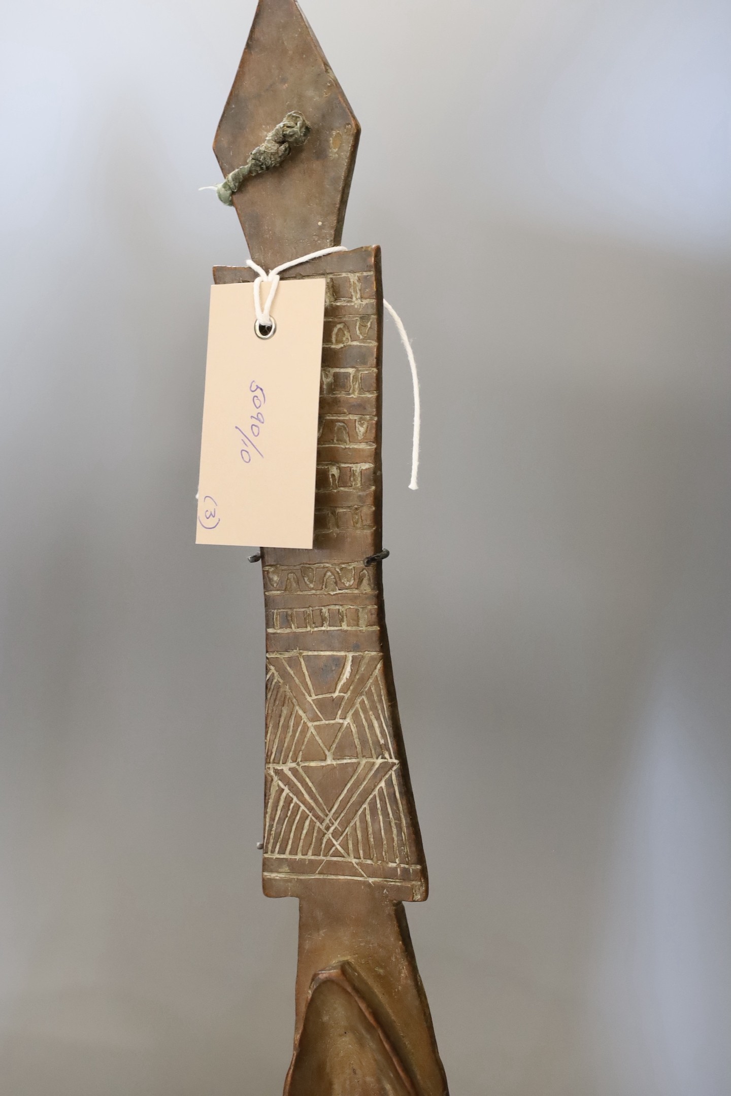 Three Sudanese chip-carved spoons